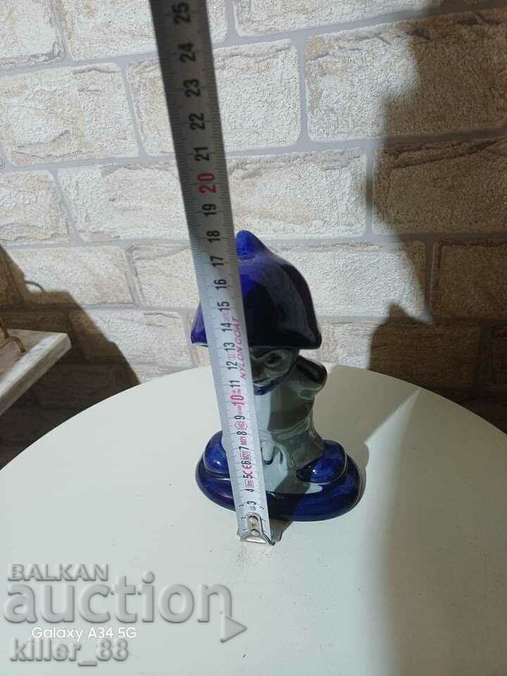 Auction A playful figurine with 2 faces Auction A playful figurine with 2 faces