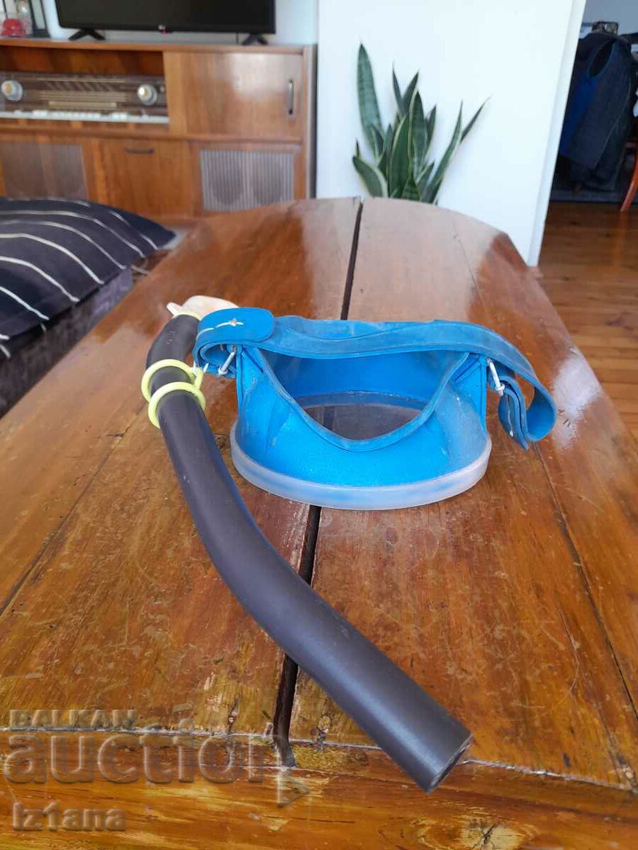 Old snorkel and swimming goggles, diving mask