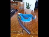 Old snorkel and swimming goggles, diving mask