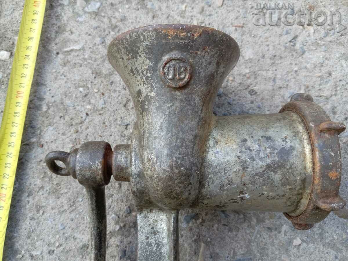 Delivery of Old metal meat grinder machine for grinding meat