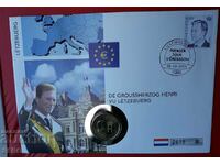 Luxembourg-2 euro 2004 and postage stamp in a beautiful envelope