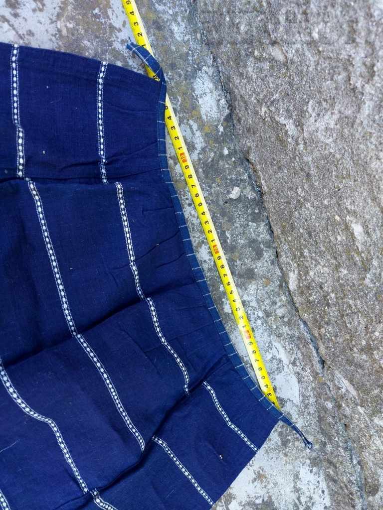 Delivery of AUTHENTIC OLD APRON WEARING A LARGE WINDSHIELD CRANK Delivery of AUTHENTIC OLD APRON WEARING A LARGE WINDSHIELD CRANK