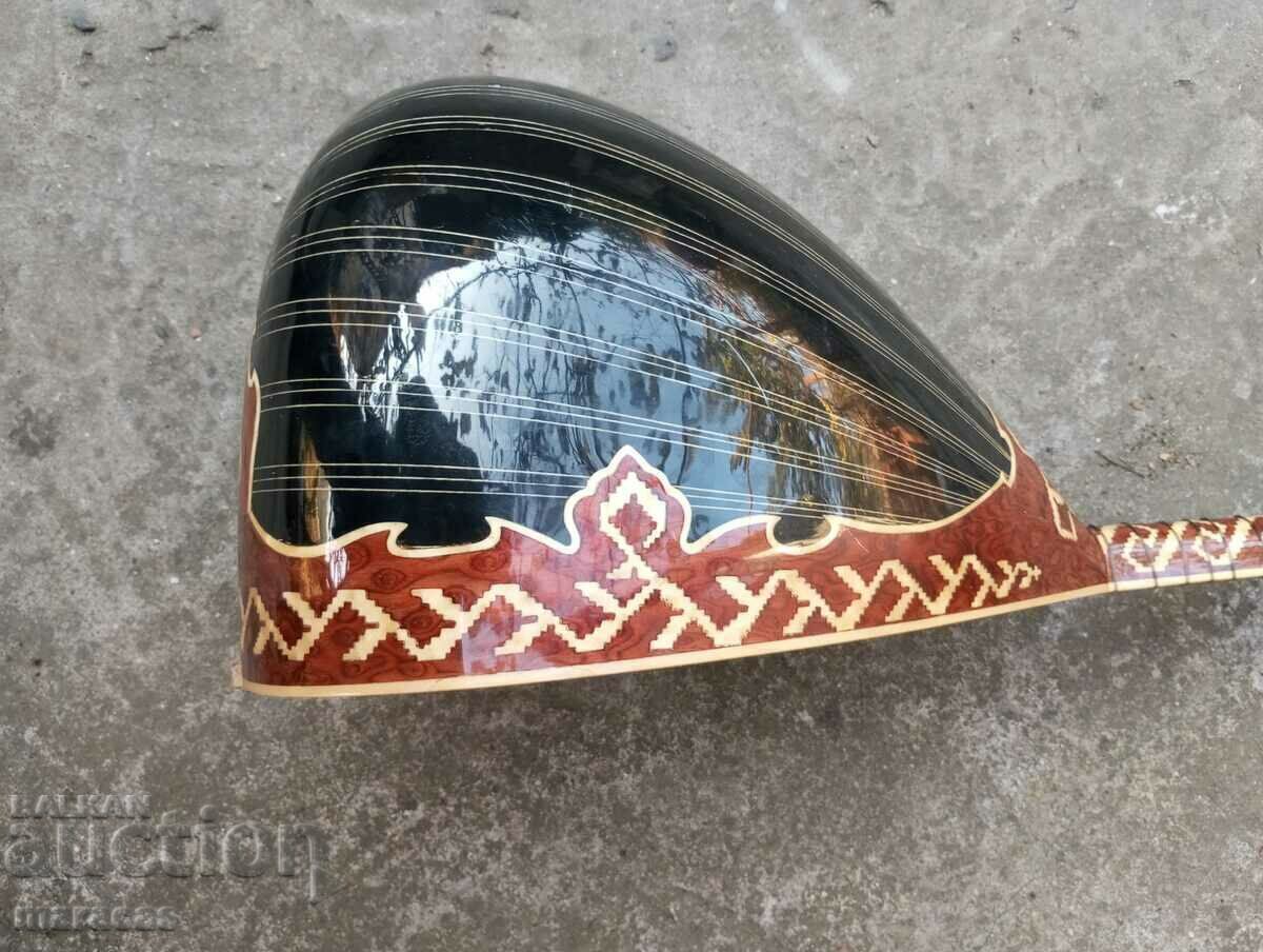 A wooden musical instrument with price 175.00 BGN | € 89.48 A wooden musical instrument with price 175.00 BGN | € 89.48