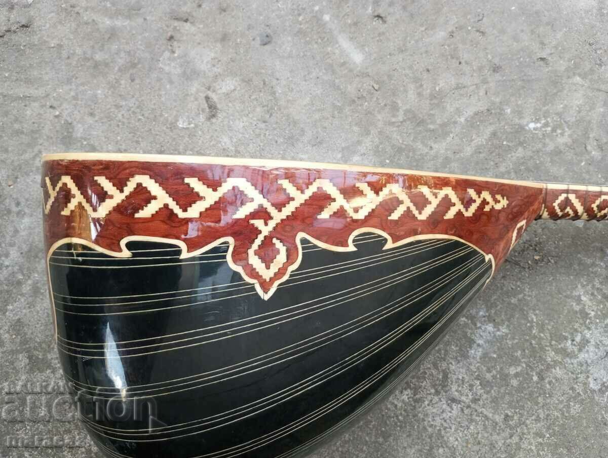 A wooden musical instrument - 6 A wooden musical instrument - 6