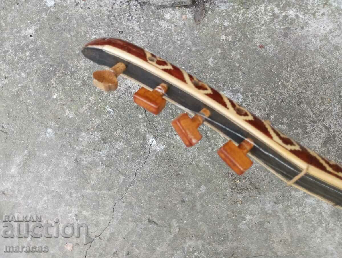 A wooden musical instrument - 7 A wooden musical instrument - 7