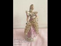 A unique beautiful porcelain figure with markings