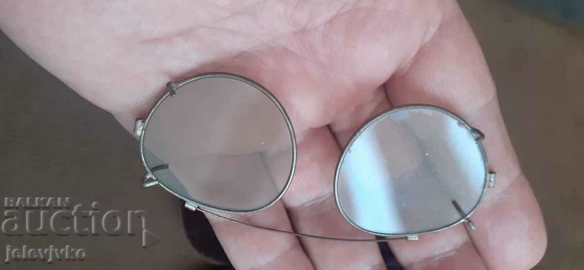 Auction  Old glasses with a tin frame