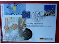 Germany-2 euro 2009 and postage stamp in a beautiful envelope