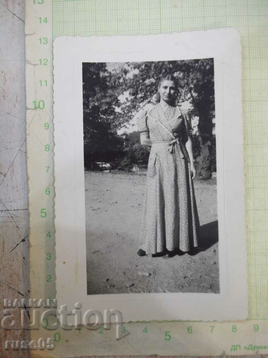 Old photo of a woman in the park