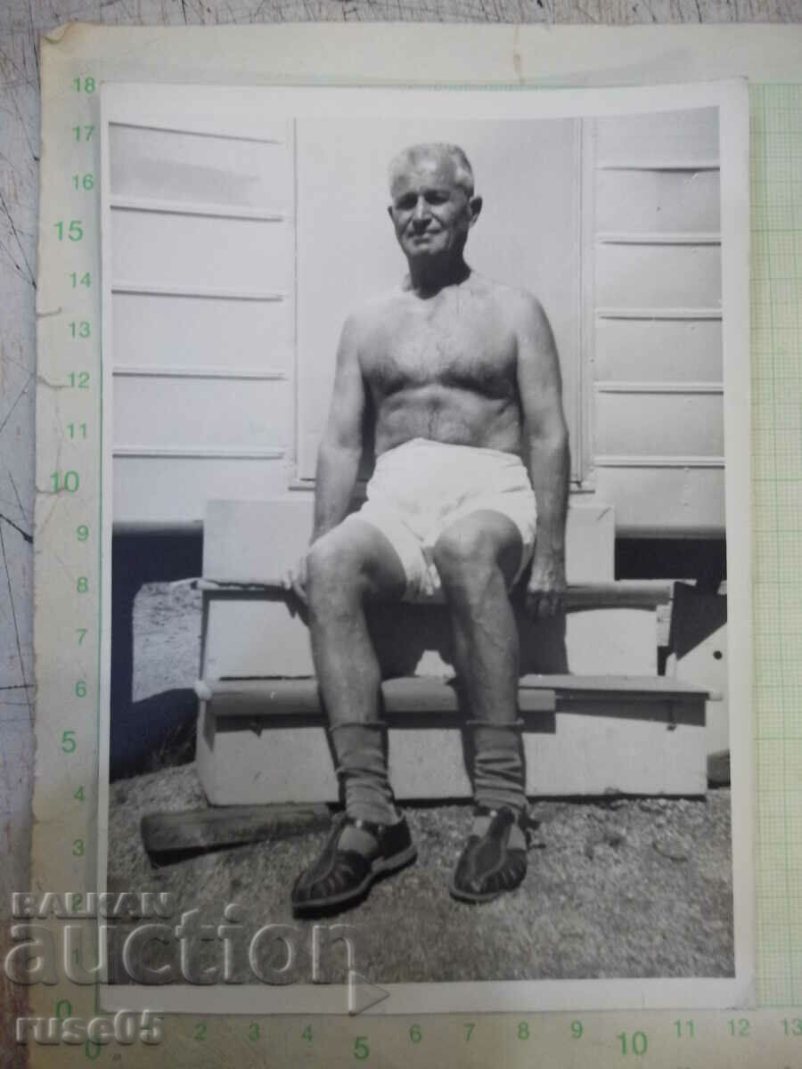 Old photo of a man in front of the house in America - 1