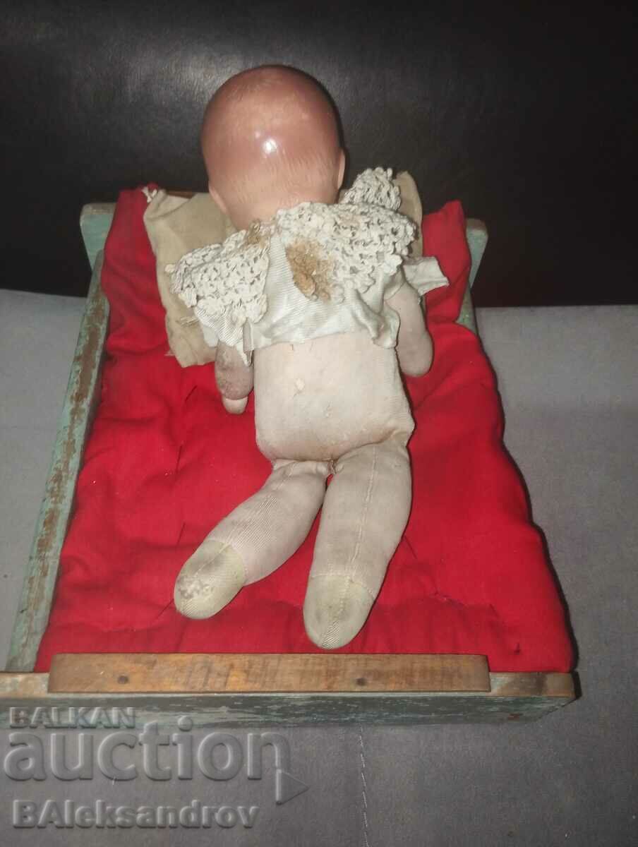 Delivery of Old baby doll with bed Delivery of Old baby doll with bed