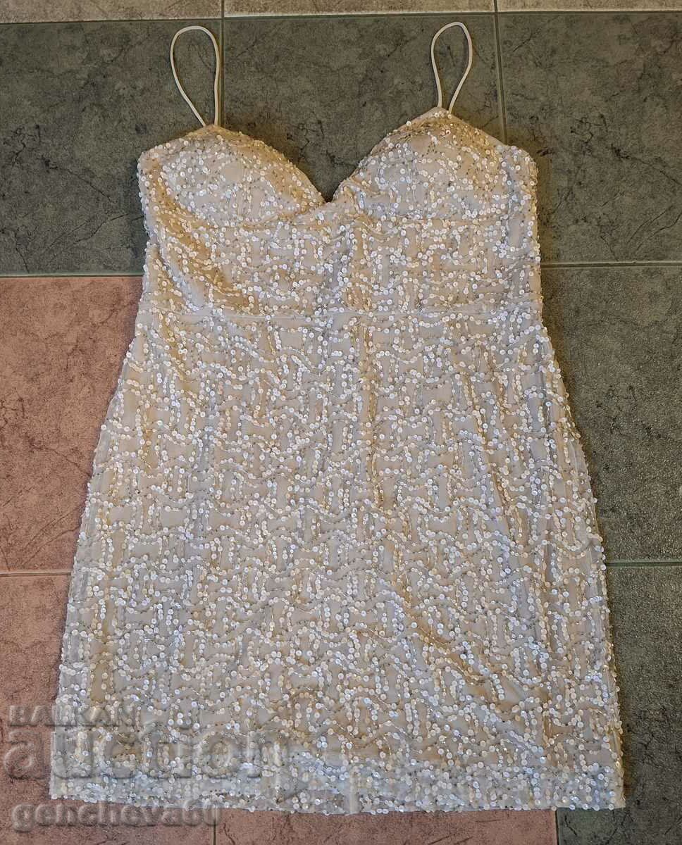 Elegant dress with sequins and beads