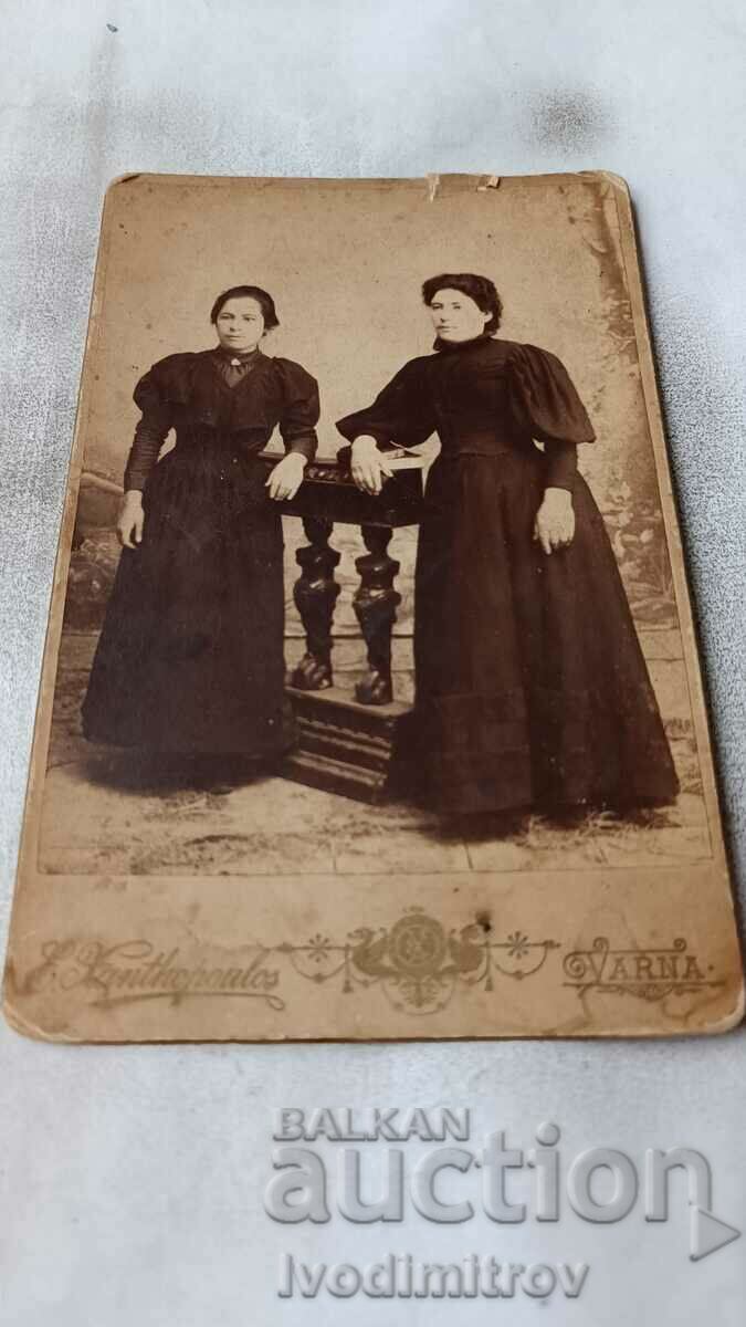 Photo Two young women in black dresses Cardboard