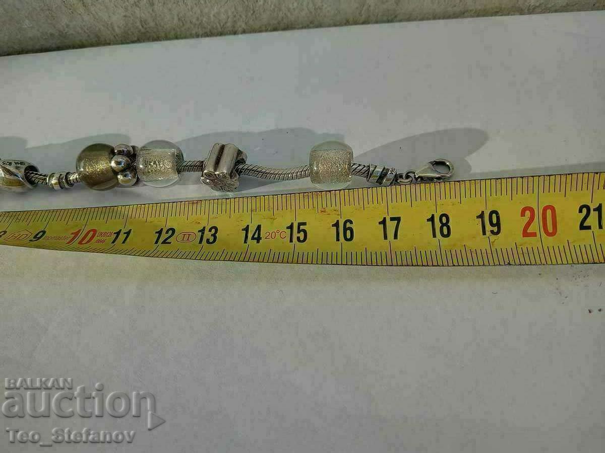 Сребърна гривна Пандора масивно сребро с циркони с цена € 110.00 | 215.14 лв.