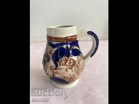 German porcelain embossed mug