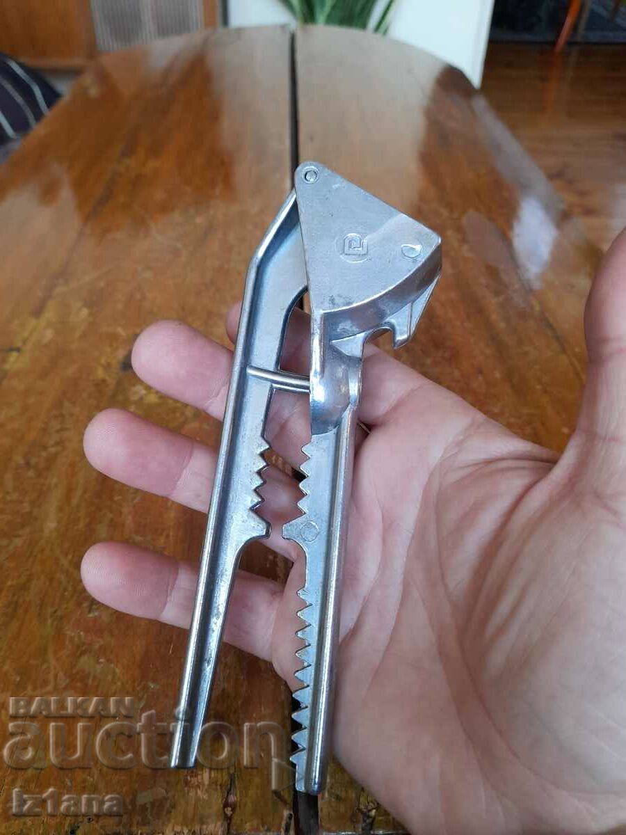 Auction  Old aluminum garlic press