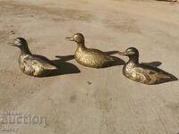 Bronze ducklings for interior decor