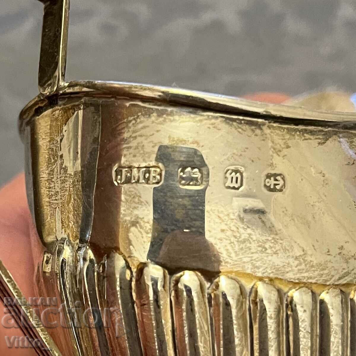 Delivery of English silver saucer, jug, markings