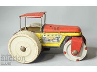 Old Rare metal mechanical toy roller model