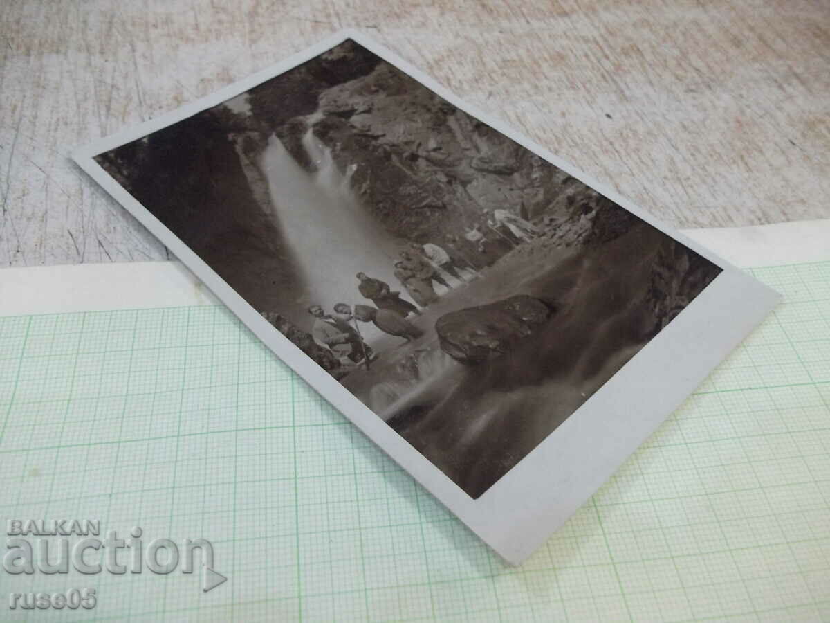 Auction An old photo of a group of young people in front of the waterfall Auction An old photo of a group of young people in front of the waterfall
