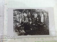 Old photo of a group of young people on a bridge