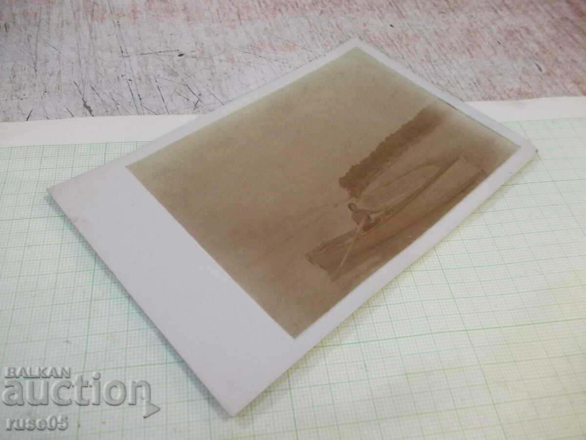 Auction Old photo with a boat in the river Auction Old photo with a boat in the river