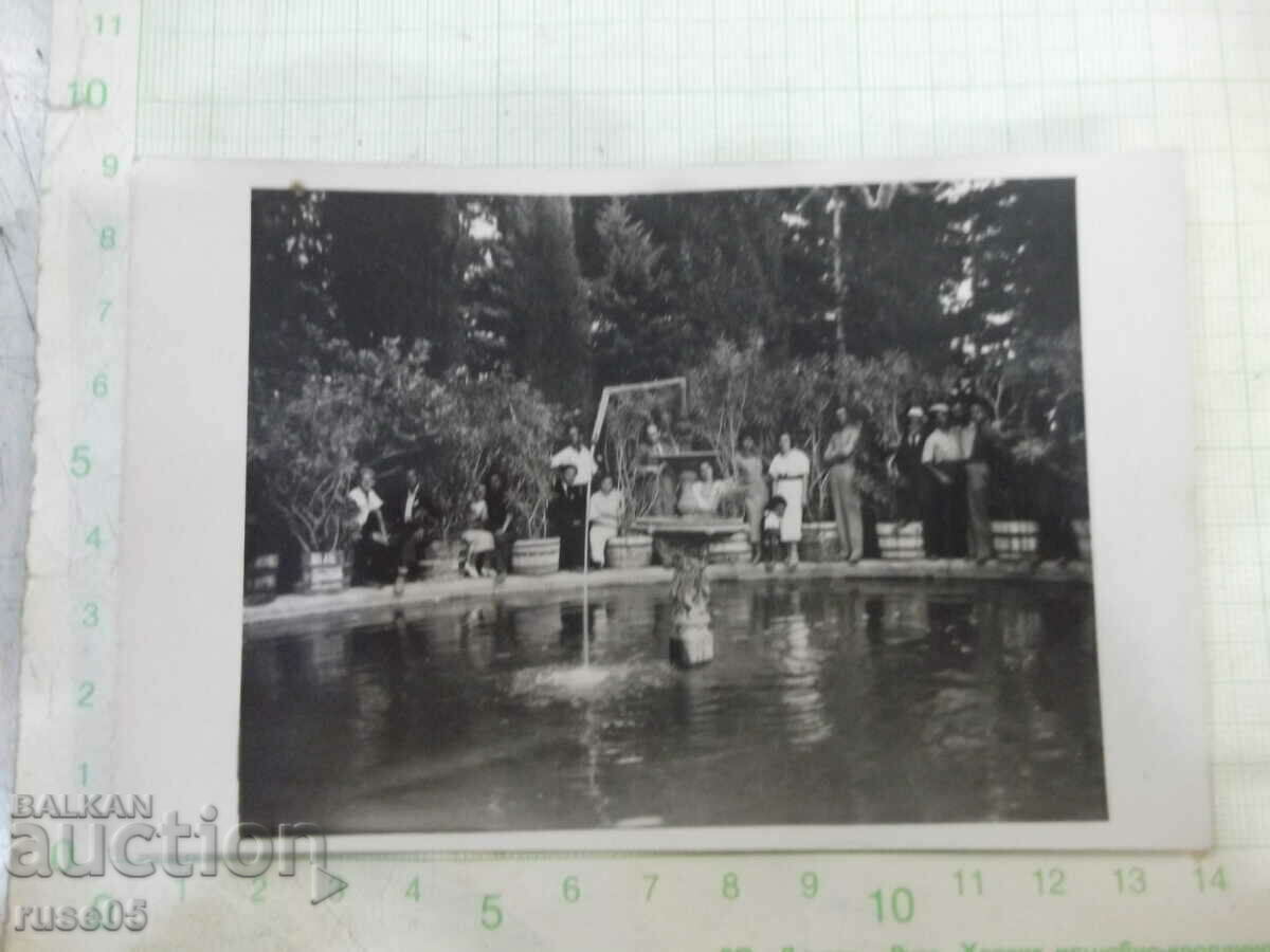 Old photo in front of the fountain