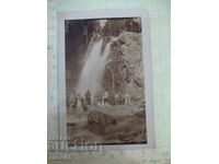 Old photo of a group of young people in front of the waterfall - 1