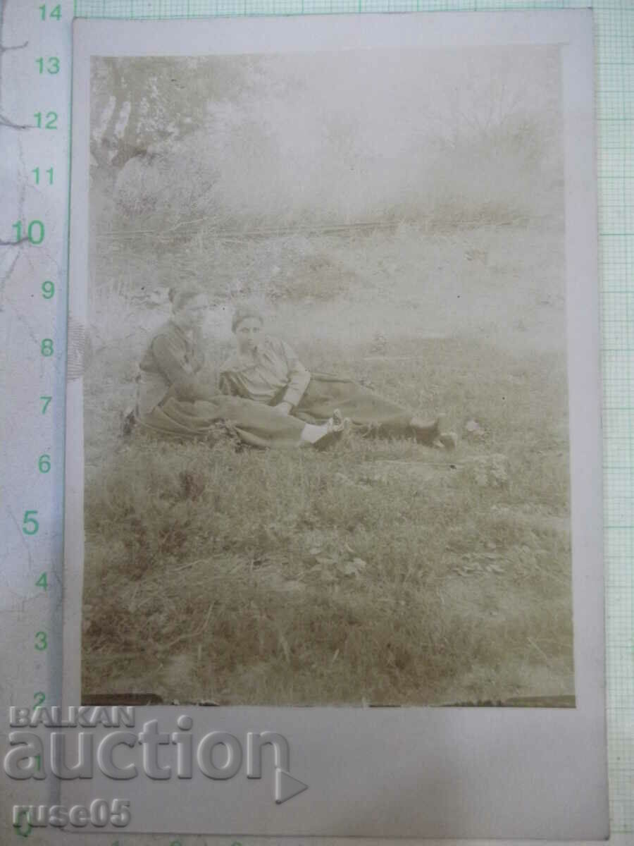 Old photo of two women in a field