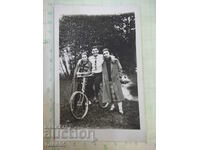 Old photo of the river with a bicycle