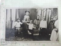 Old photo of grandfather and grandmother with three grandchildren