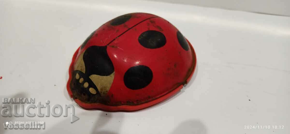 Old metal toy ladybug made of sheet metal Old metal toy ladybug made of sheet metal
