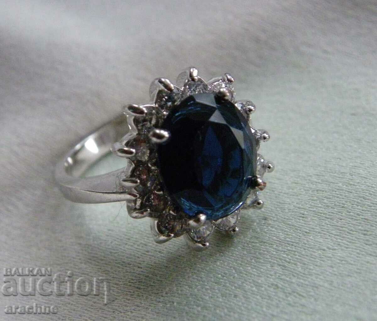 Silver ring with london blue topaz