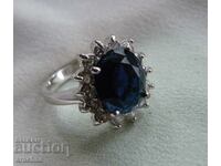 Silver ring with london blue topaz