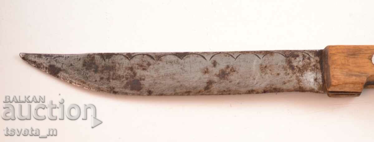 Auction Antique knife with a wooden handle Auction Antique knife with a wooden handle