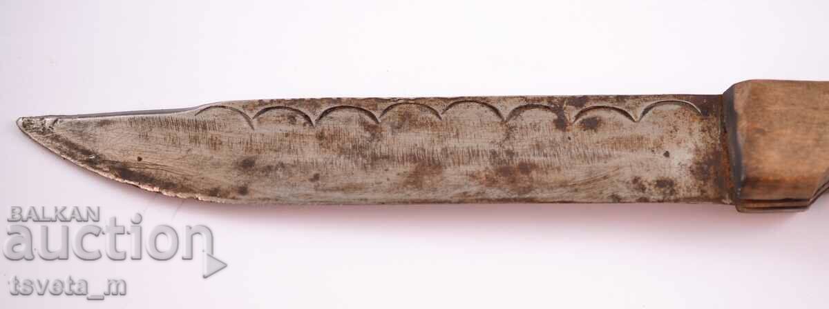 Auction Antique knife with a wooden handle Auction Antique knife with a wooden handle
