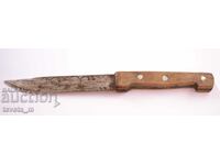 Antique knife with a wooden handle