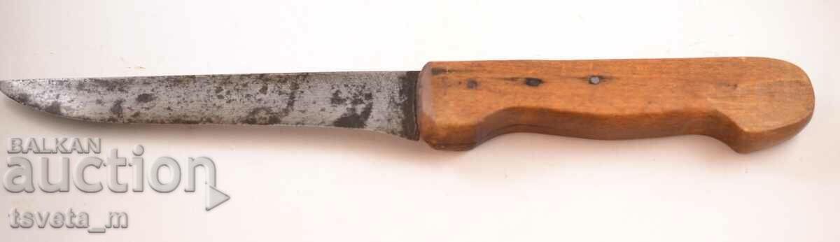 Antique knife with a wooden handle