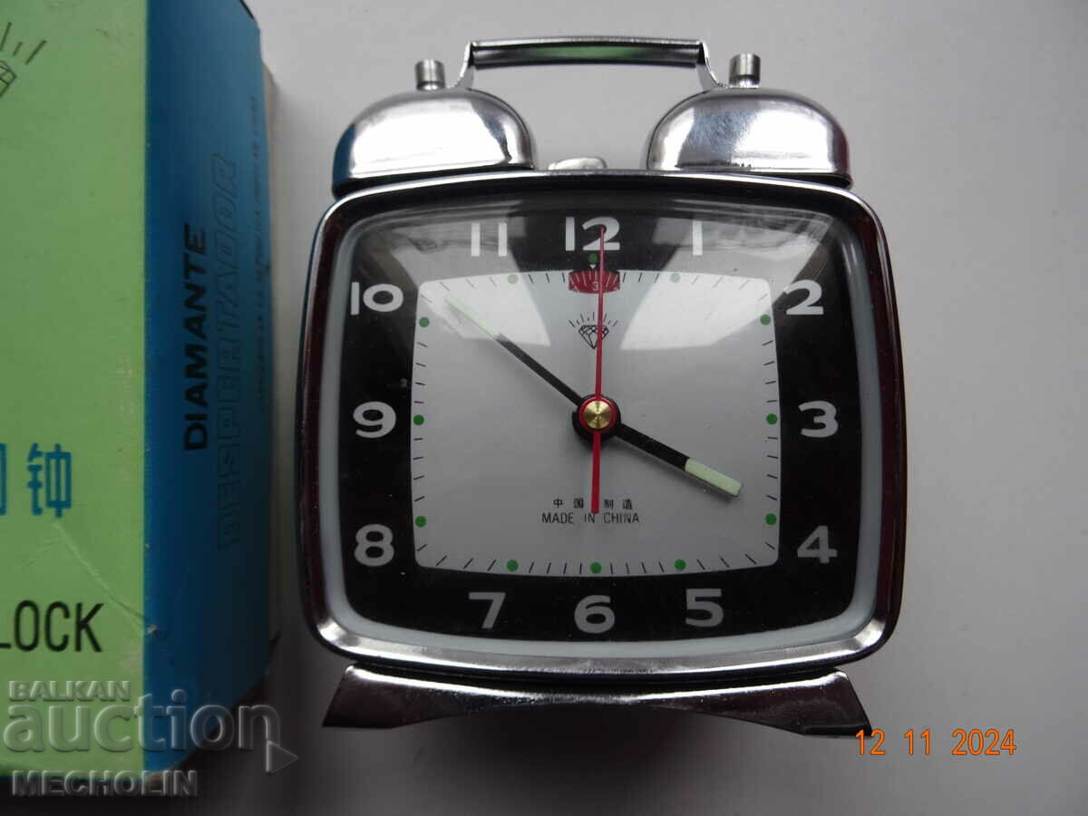 Delivery of COLLECTIBLE CHINESE ALARM CLOCK PHONE Delivery of COLLECTIBLE CHINESE ALARM CLOCK PHONE
