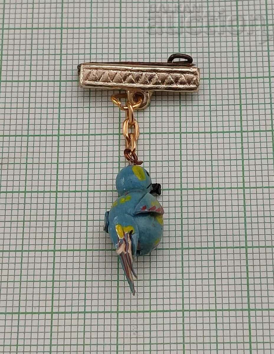 Auction  BLUE PARROT OLD MARTENICE BADGE