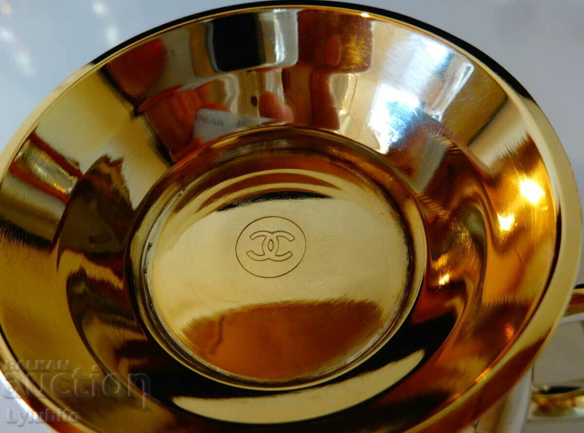 Auction Bronze Chanel goblet from 1925, marked Auction Bronze Chanel goblet from 1925, marked