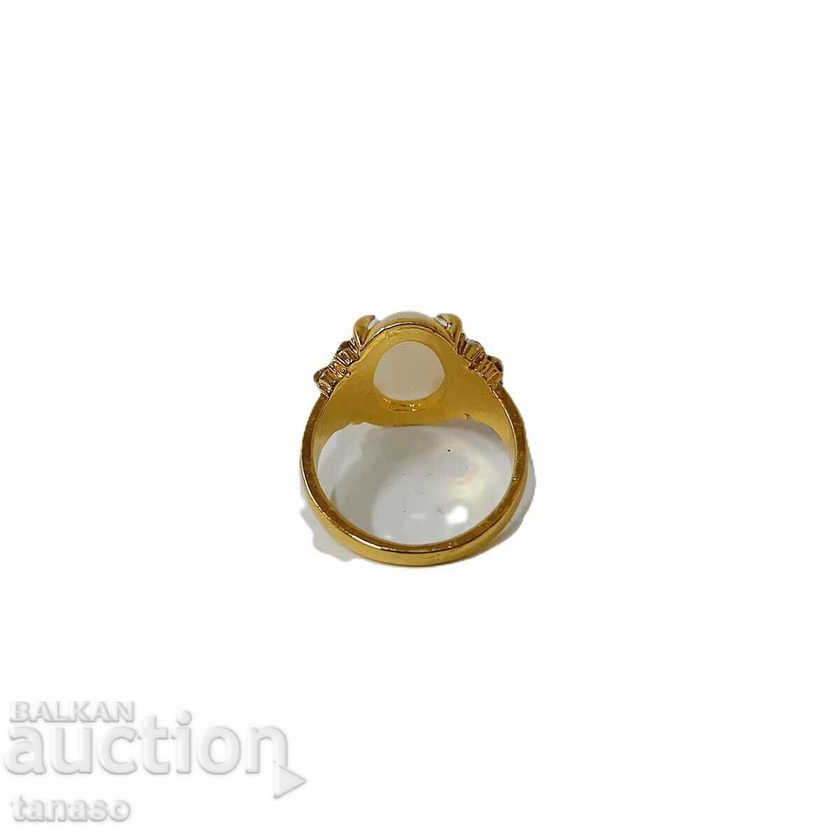 Auction  Elliptical cut amber ring