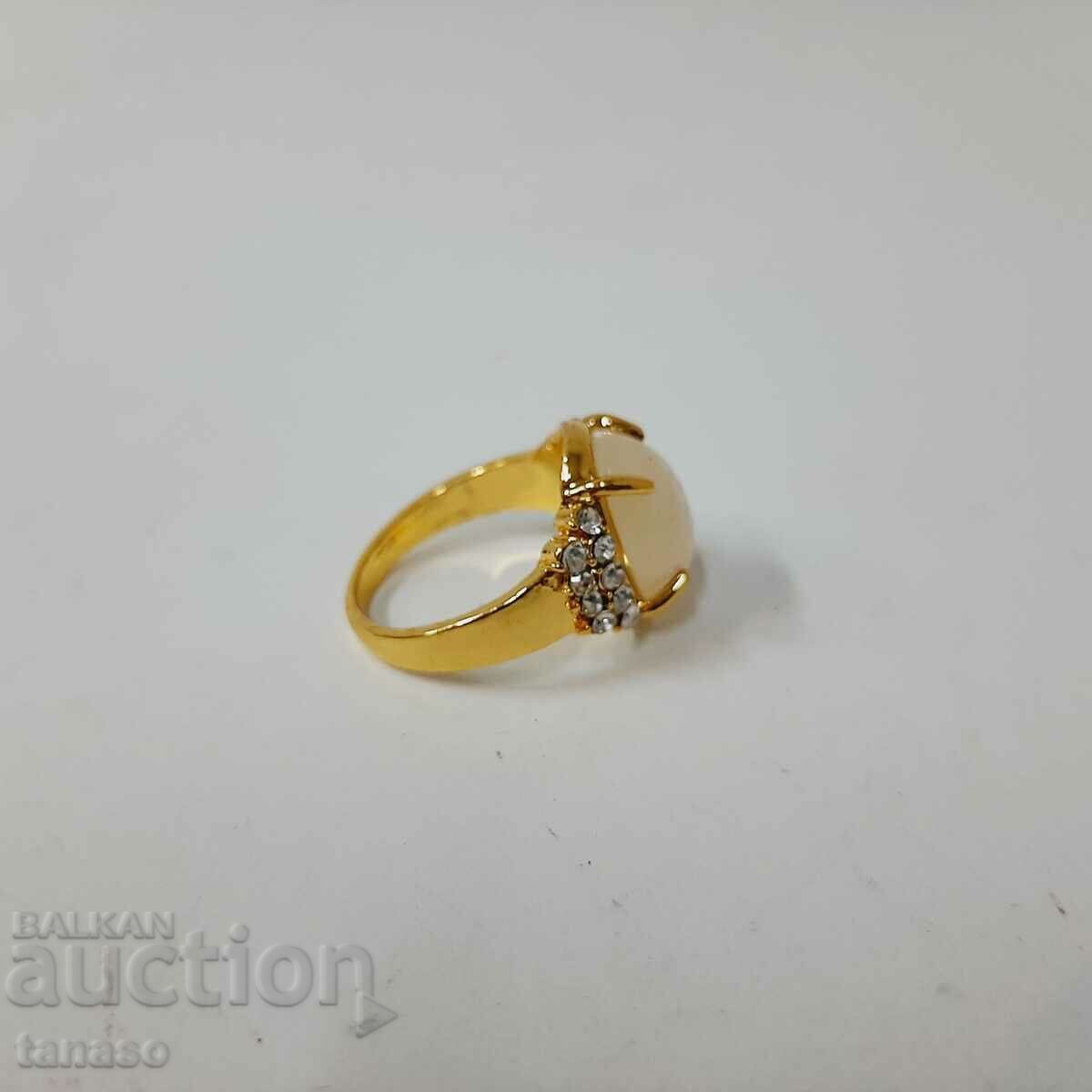 Delivery of Elliptical cut amber ring