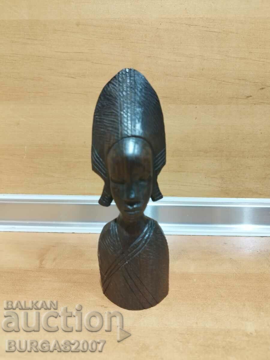 Old wooden figure, African woman