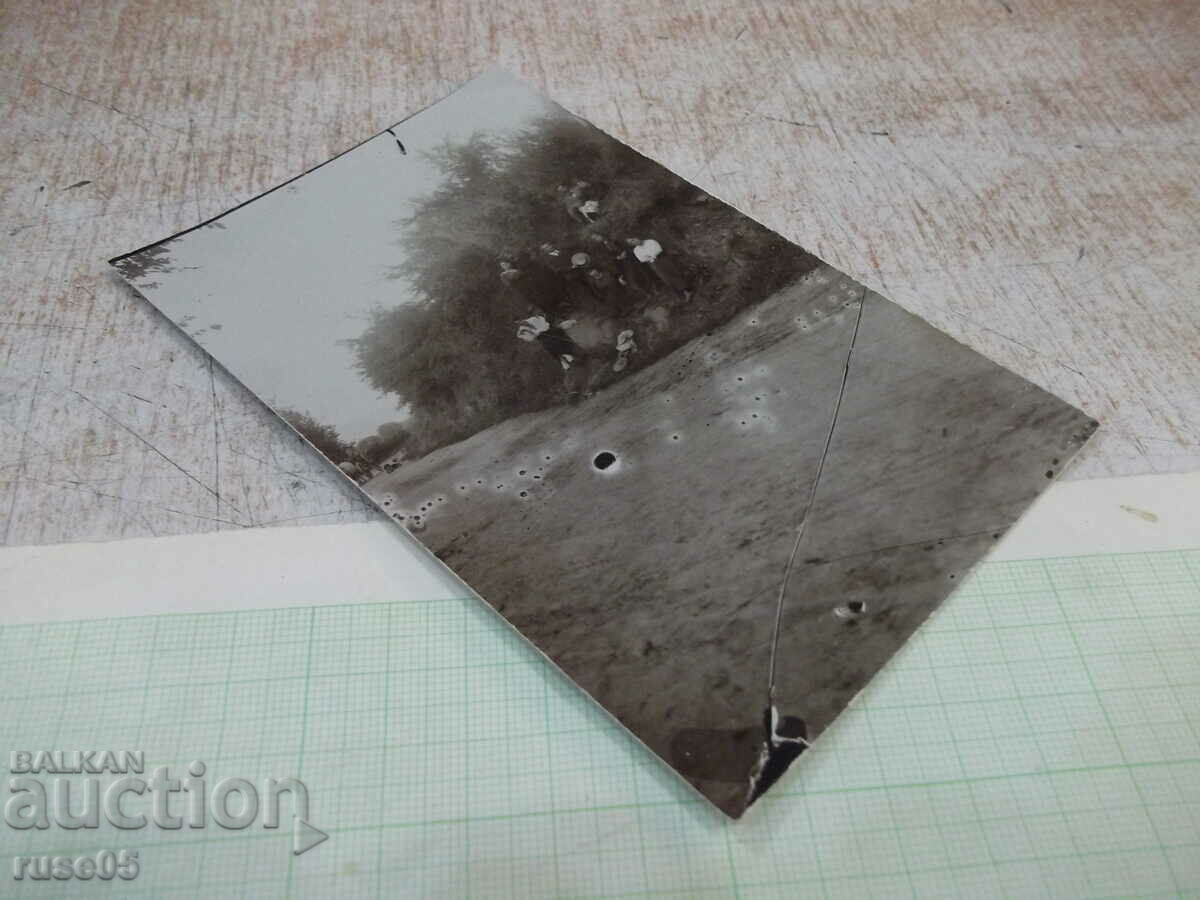 Auction  Old photo of young people on the road