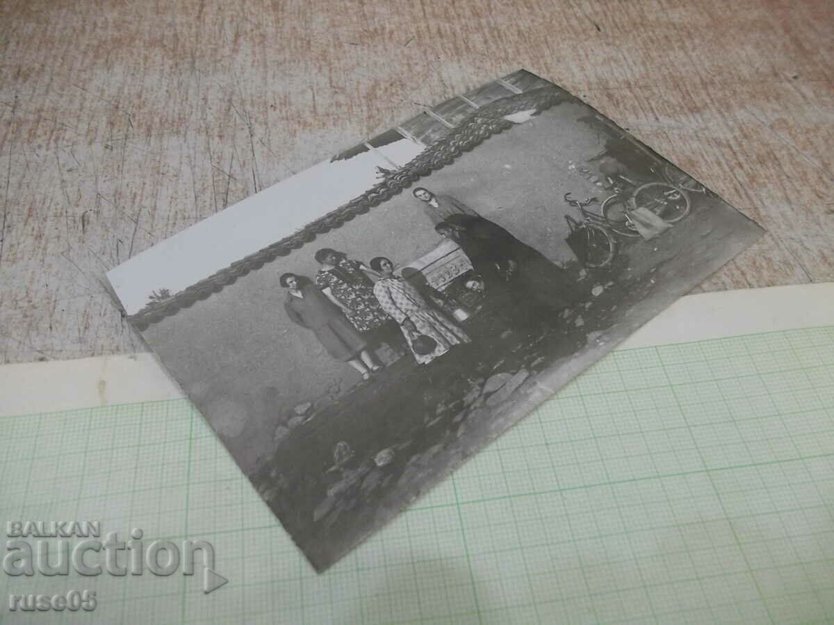 Auction  Old picture of water fountain with bicycles