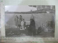 Old picture of water fountain with bicycles