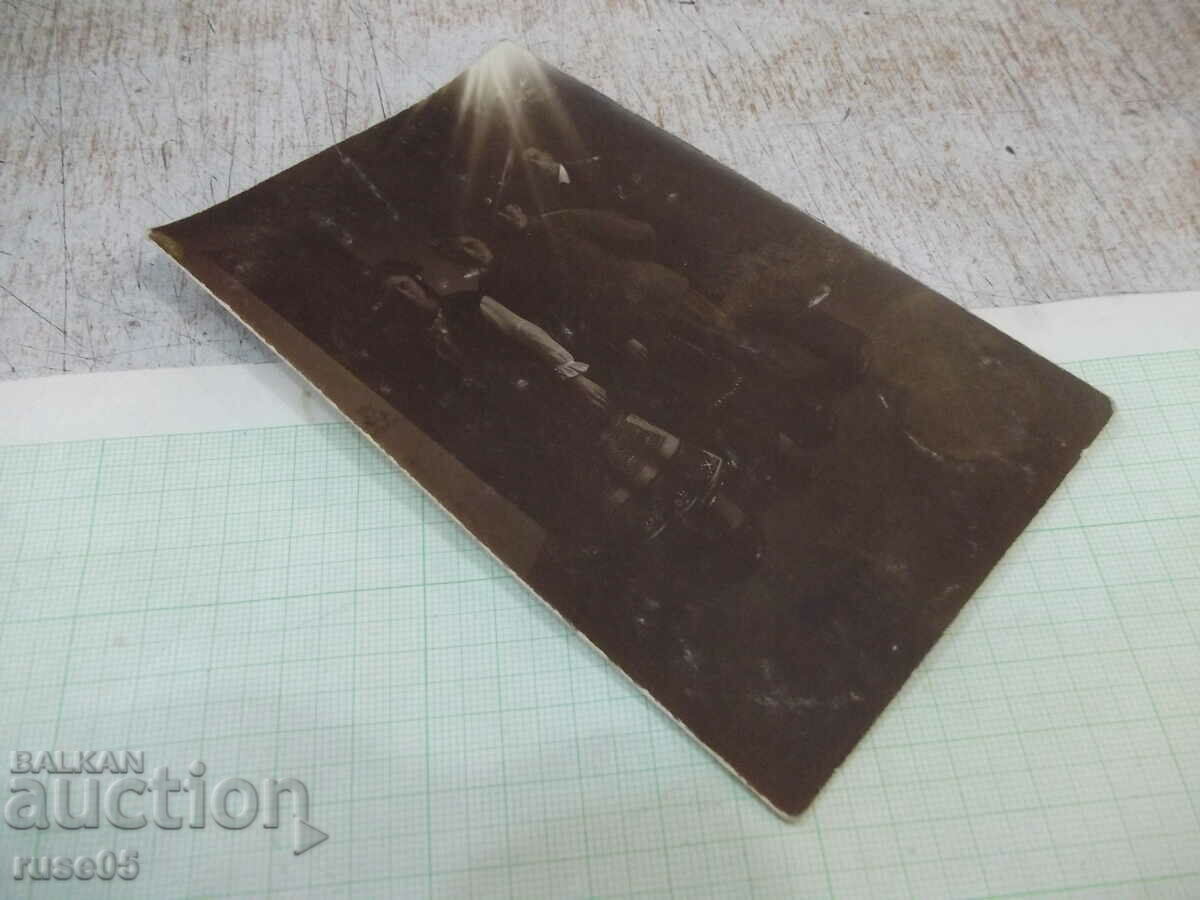 Auction  Old photo of two women and two men