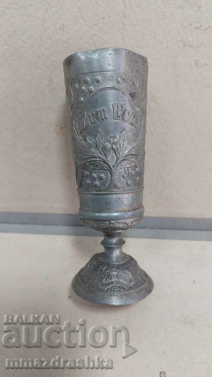 Antique metal cup