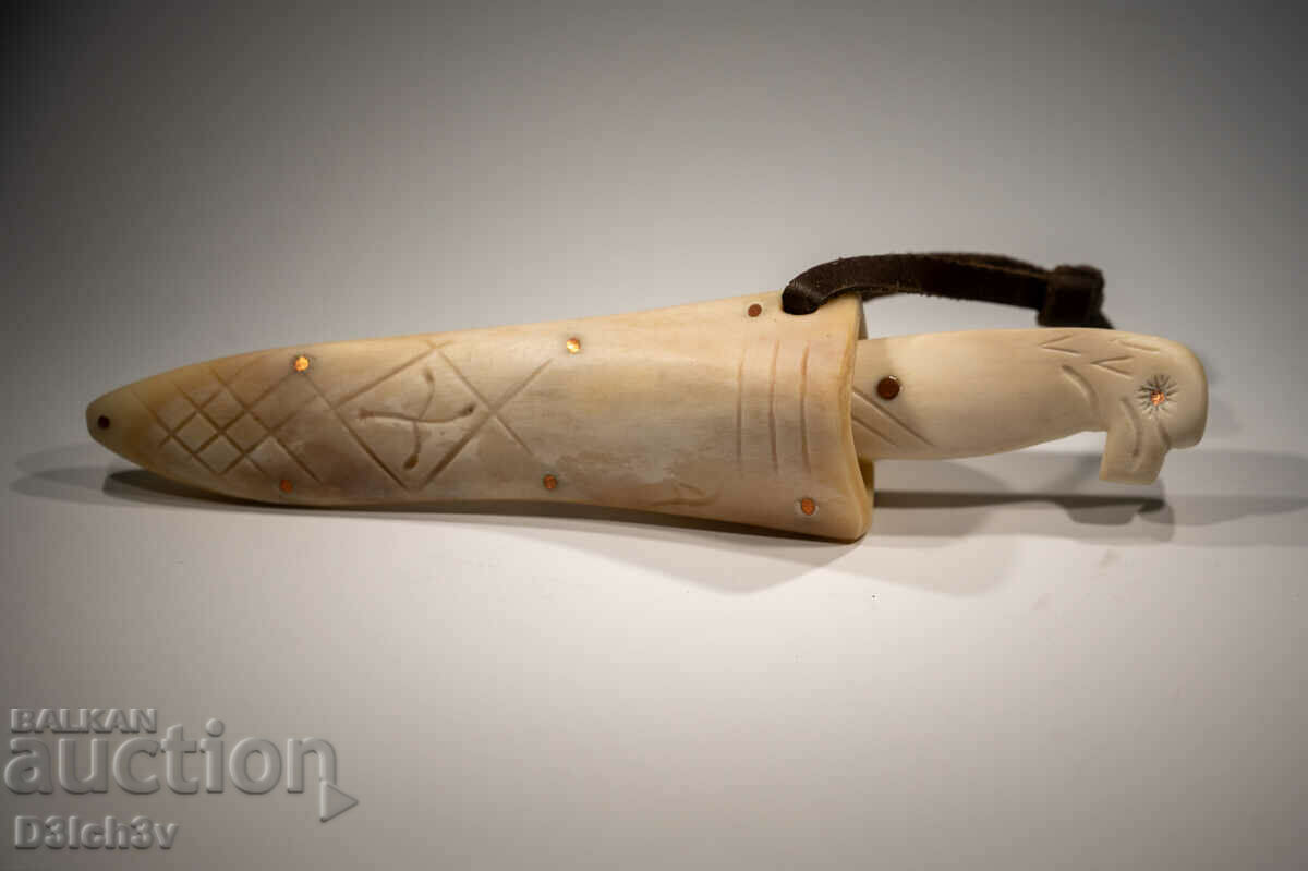 Knife with eagle head handle and calf bone handle